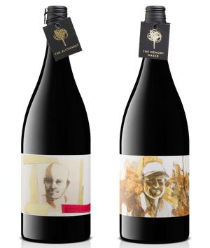 Two wine bottles with labels featuring images of people on a white background